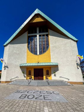 Church and sanctuary of St. Teresa Benedicta of the Cross (Edith Stein) in Lubliniec, Poland.Inscription: God bless you.. clipart