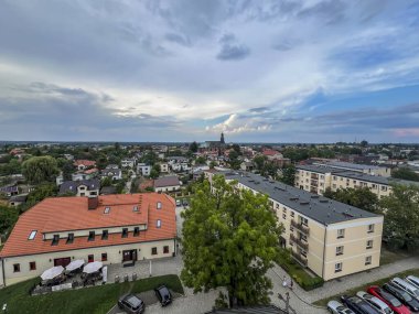 View of Koszecin in Poland from the tower next to the church in the palace and park complex. clipart