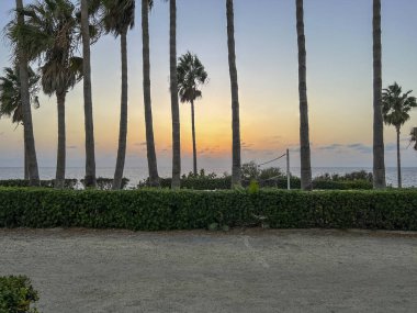 Kıbrıs 'ın Paphos ilçesindeki Kissonerga plajında Akdeniz' de gün batımı.