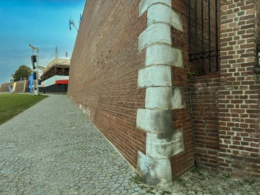 Defensive walls around the Sanctuary at Jasna Gora in Poland with visible hornstones or headstones. clipart