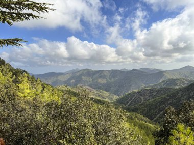 Mountain panorama seen from Throni Hill from the area of Kykkos Monastery in the Troodos Mountains in Cyprus, close to the village of Milikuri clipart