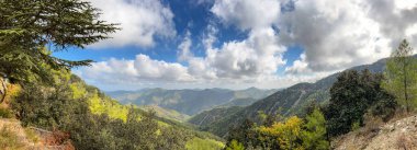 Mountain panorama seen from Throni Hill from the area of Kykkos Monastery in the Troodos Mountains in Cyprus, close to the village of Milikuri clipart