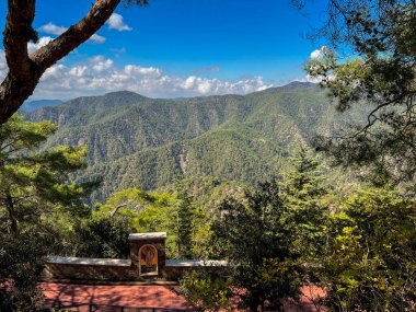 Mountain panorama seen from Throni Hill from the area of Kykkos Monastery in the Troodos Mountains in Cyprus, close to the village of Milikuri clipart