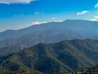 Mountain panorama seen from Throni Hill from the area of Kykkos Monastery in the Troodos Mountains in Cyprus, close to the village of Milikuri clipart