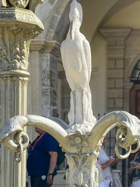  Detail of the cast iron fountain in memory of Sister Sophie Chambon in front of the entrance to the Monastery of St. Joseph in Michalaki Paridi Square in Larnaca, Cyprus. clipart