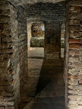 Chelm, Poland, September 12, 2024: The basements and crypts under the basilica in the Sanctuary of Our Lady of Chelm in eastern Poland, open to the public since 2018. clipart