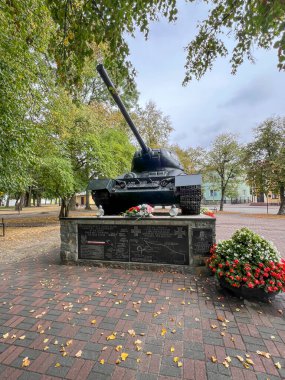 Sawin, Poland, September 11, 2024: Soviet T 34 tank from WW2 as a monument in the town of Sawin in eastern Poland. In August 1944, the Dresden Armored Corps was established in the nearby Sawin forests. clipart