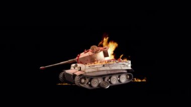 Bozuk ve yanan bir tareti olan ağır bir tank.
