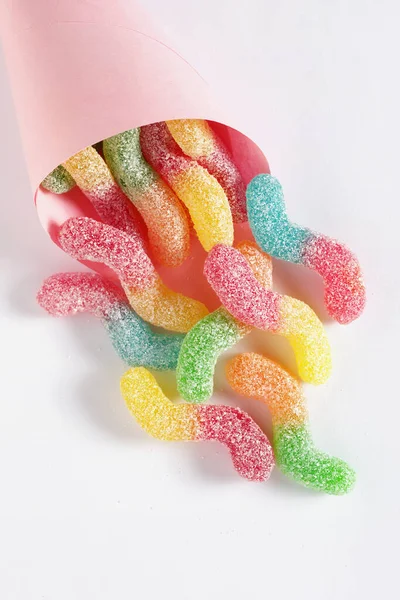 Sugar Coated Sour Tasting Colorful Gummy Worms Pink Paper Bag — Φωτογραφία Αρχείου