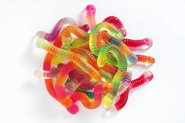Heap Bright Colorful Jelly Worms White Background Top View — Stock fotografie