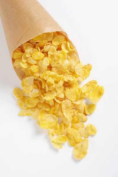 Cornflakes Papieren Zak Witte Achtergrond Close — Stockfoto