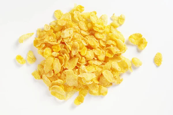 Heap Van Cornflakes Witte Achtergrond Bovenaanzicht — Stockfoto
