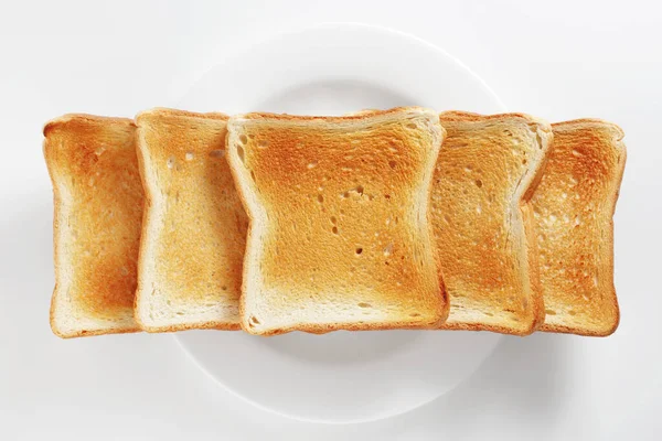 Beyaz Arka Planda Bir Tabakta Kızarmış Ekmek Üst Görünüm — Stok fotoğraf