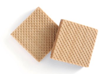 Kakaolu gofretler beyaz arka planda kare şeklinde, üst görünümde.