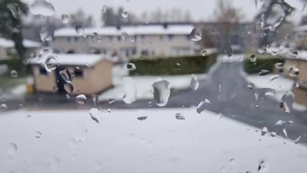 Abstrato Chuva Neve Trenó Janela Direção Casas Vizinhas — Vídeo de Stock