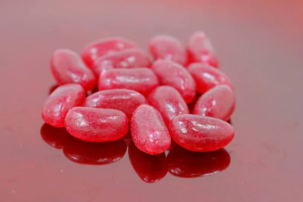 Red Jelly Beans Thought Crushed Lice — Stock fotografie