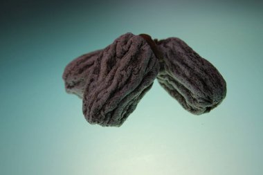 close-up from dried persimmon on gradient background