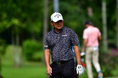 Malezyalı Danny Chia, Kelab Golf Seri Selangor 'daki PKNS Selangor Masters 22 raundunun 3. raundunda çekilmiştir. Petling Jaya, Malezya 25 Kasım 2022.