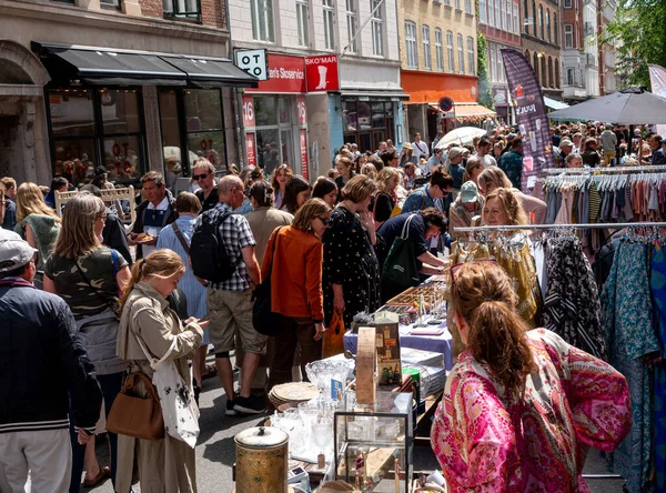 stock image Street with flea market full of crowd of people. Copenhagen, Denmark - June 3, 2023.