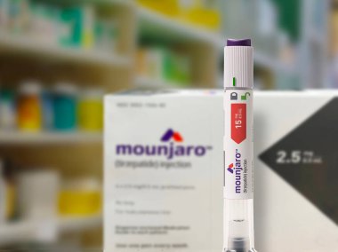 Mounjaro - Tirzepatide with injection pen is an antidiabetic medication used for the treatment of type 2 diabetes to lose weight and control blood sugar. Copenhagen, Denmark - November 8, 2023. clipart