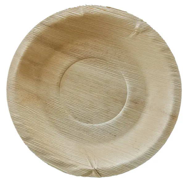 Palmiye yaprağı tek kullanımlık plaka beyaz arka planda izole edilmiş. Doğal düşen palmiye yapraklarından yapılan biyolojik olarak bozunabilir gübreleme. Yüzde yüz doğal ürün, hiçbir kimyasal madde kullanılmıyor. Çalkalanabilir ve bahçe atıklarıyla atılabilir..