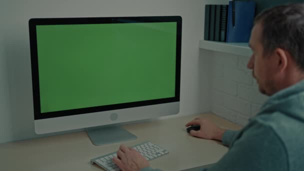 Guy Wearing Gray Hoodie Sitting Desk Playing Online Game Computer — Stock Video