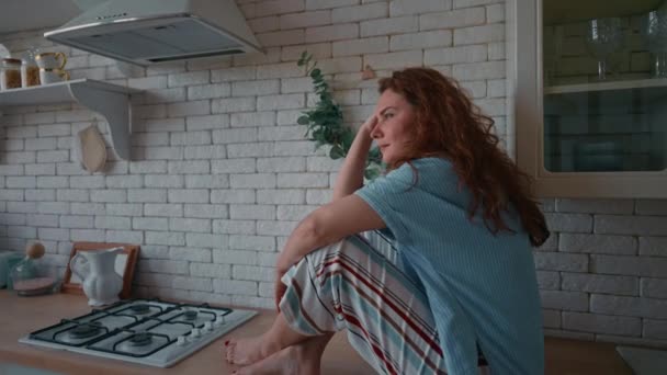 Daydream Vacation Thoughtful Tired Woman Wearing Pajamas Sitting Kitchen — Video