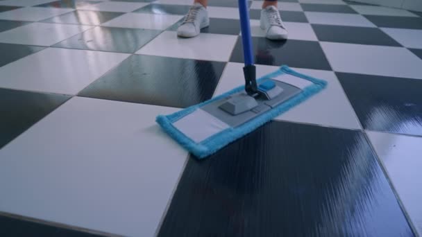 Worker Mopping Floor White Black Colors Office Using Mop — Stockvideo
