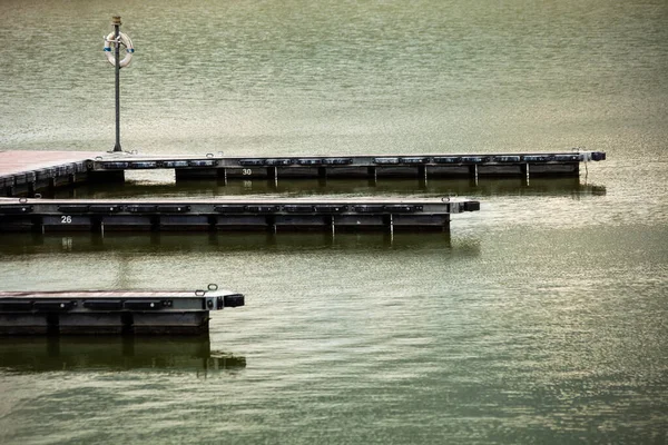 Small Empty Dock River While Raining Royalty Free Stock Images