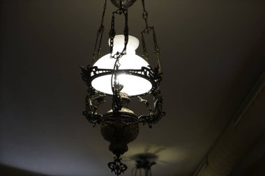 chandelier hanging on black background