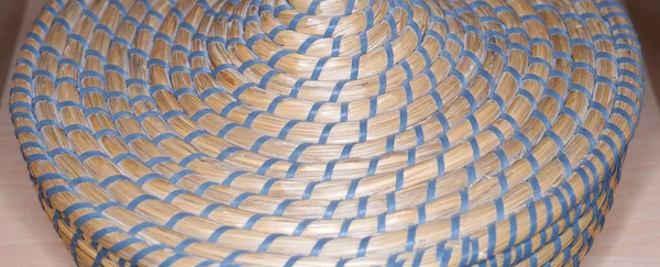 close up of a white plastic basket with a net