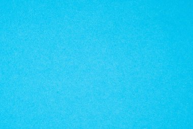 Arka planda sağlam bir yapısı olan renkli kağıt, stüdyoda çekildi.