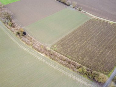 Green fields in Bavaria in the valley with aerial view in winter