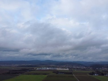 Green fields in Bavaria in the valley with aerial view in winter