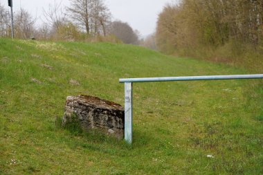 Red and white security fence with chain on the street. Coronavirus concept