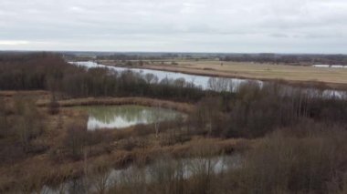 Danube with old water and water-filled pools and ponds in the nature