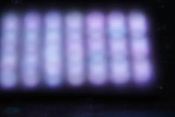スタジオショットとしてレンズフレアで撮影された焦点外の色の写真の背景 — ストック写真