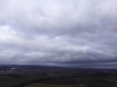 Green fields in Bavaria in the valley with aerial view in winter