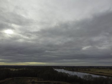 Stratus cumulus alto nimbo clouds in the blue sky are weather messengers