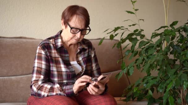 Eighty Year Old Woman Sits Telephone Works Home Close Hands — Stock Video