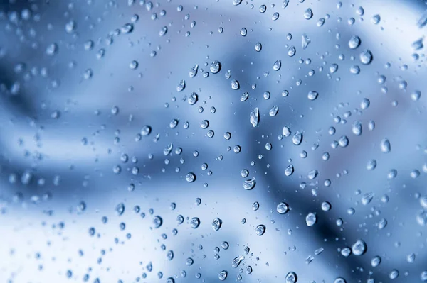Природні Краплі Води Склі Вікна Синій Фон Дощем Вікні Крупним — стокове фото