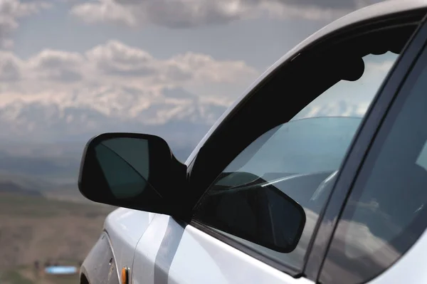 Suv Concept Mountains Clouds Close Nose Car — Stockfoto