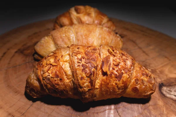 Close Pile Three Croissants Wooden Board Dark Background Delicious Healthy — 图库照片