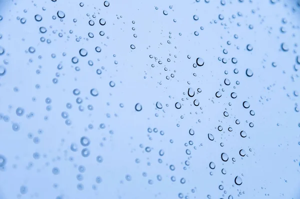 Drops Water Window Glass Close Blue Colors Background Rainy Weather — Stock Photo, Image