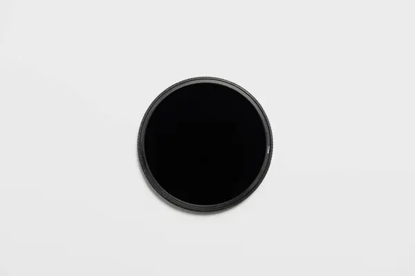 stock image Dark ND filter on a white background. Flat image neutral density filter.