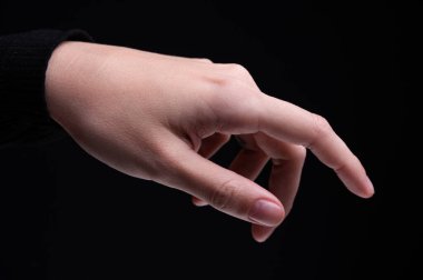 Beyaz, boş kadın eli, kadın jesti. Avuç içi kadar açık. Uzay kadınları, bir sağ yakın plan detaylı fotoğraf..