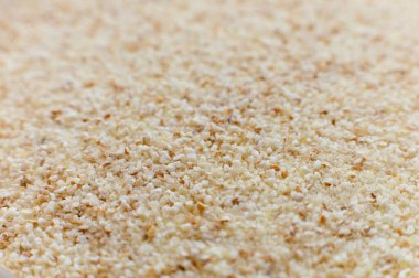 Makro modda saf irmik arka plan ve yumuşak odak. Yan görünüm.