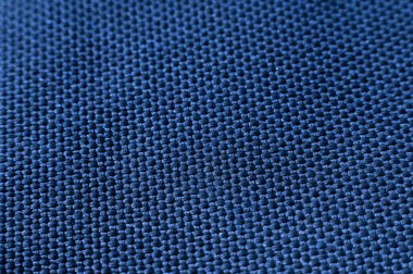 Mavi kot kumaşı. Boş kot kumaş tekstil arka planı. Yumuşak kumaş. Düz pamuk yüzeyi. Grunge yapı tasarımı. Kara donanma malzemesi. İndigo tarzı. Kopyalama alanı