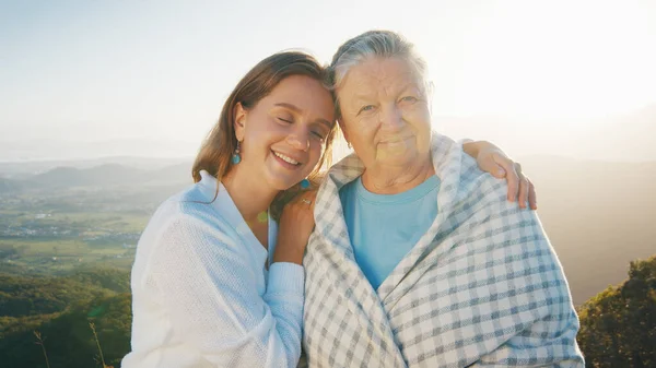 Portrait Two Women Young Elderly Young Woman Hugs Senior Caucasian — Stock Photo, Image