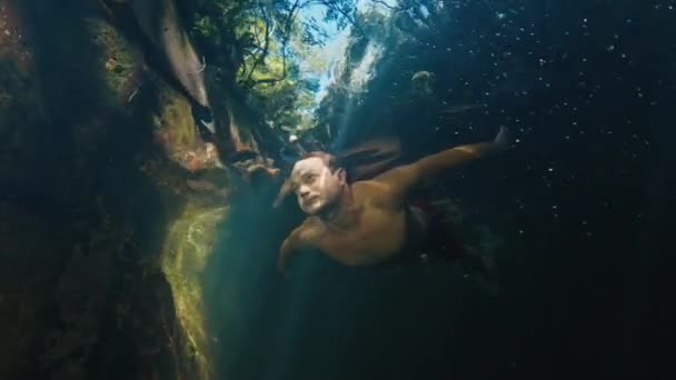 Man Dives Freshwater River Sunny Rays Shining Water — Stock Video